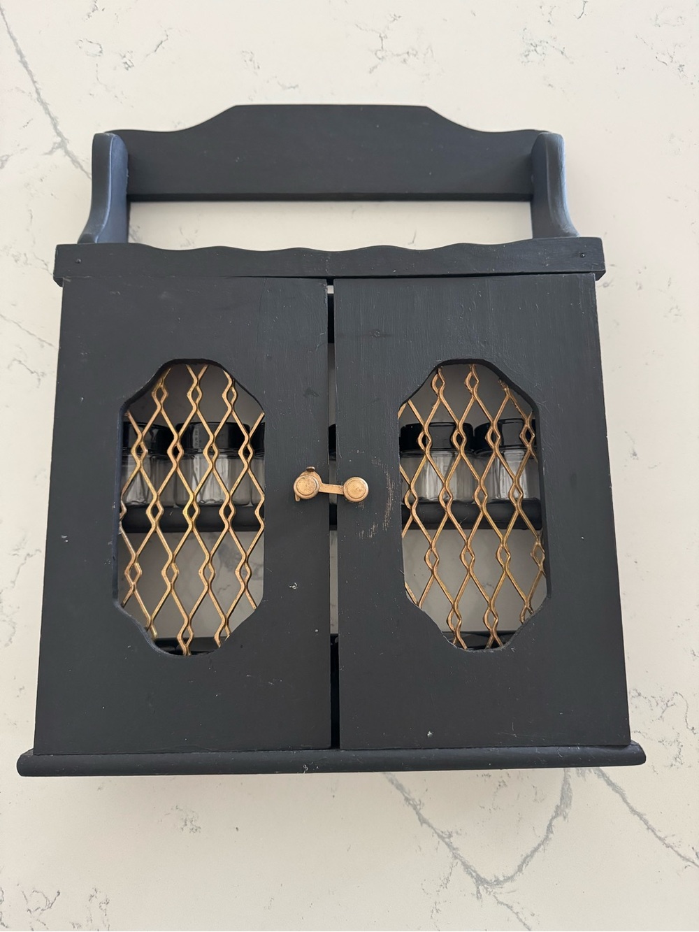 Black Wall-Mount Spice Cabinet with Gold Accent Door Grill